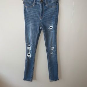 Medium wash patched jeans